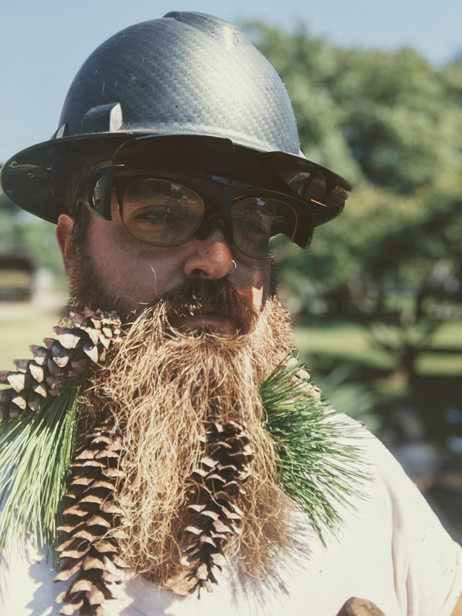 Kyle Crossland of Life And Limb Tree Care wearing a helmet outdoors